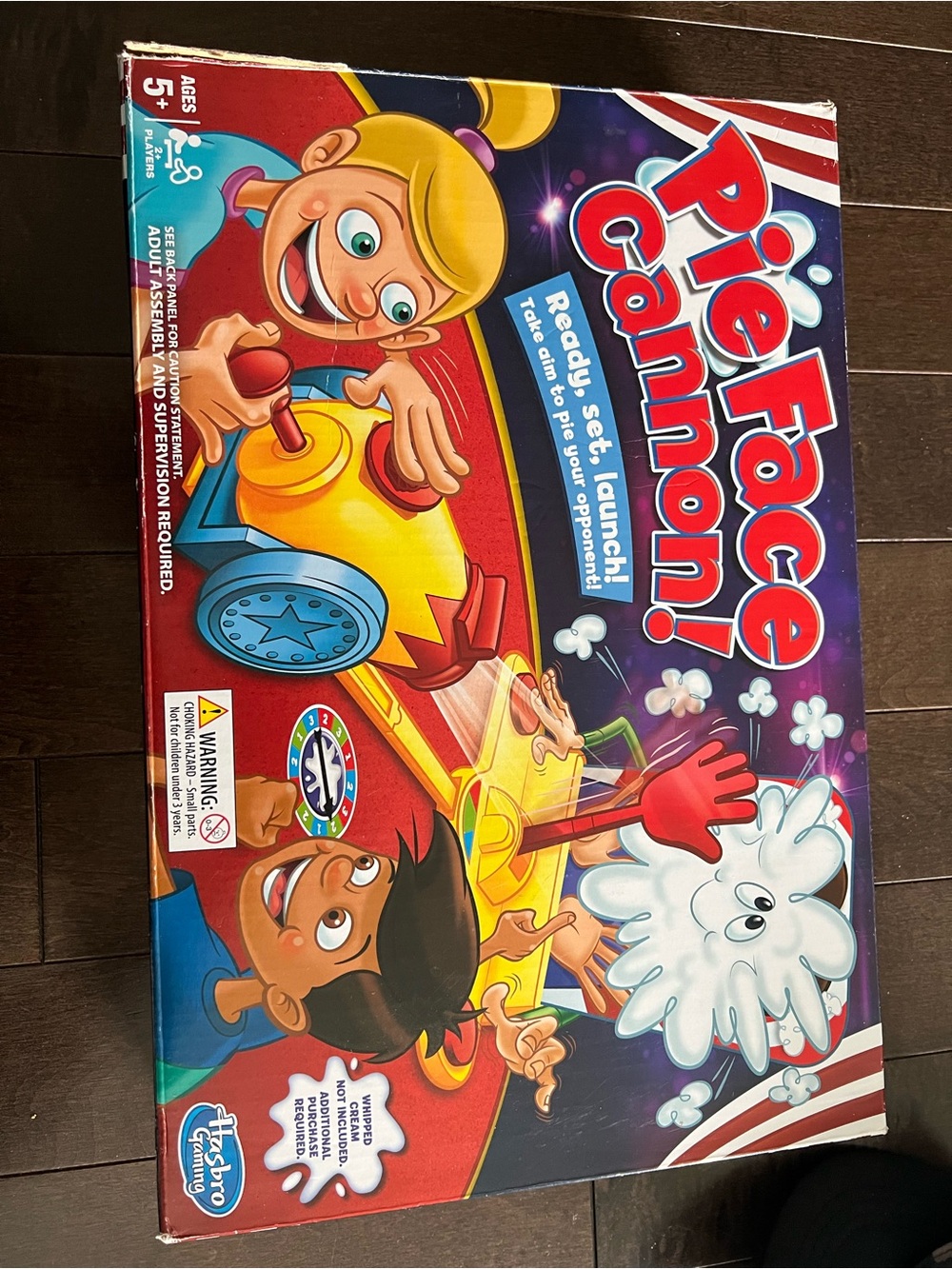 Hasbro Pie Face Cannon! Game - Red, Yellow & Blue Box Art